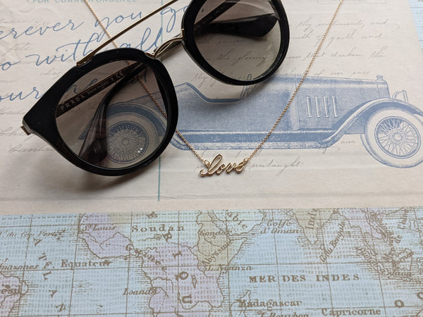 "love" cursive script necklace