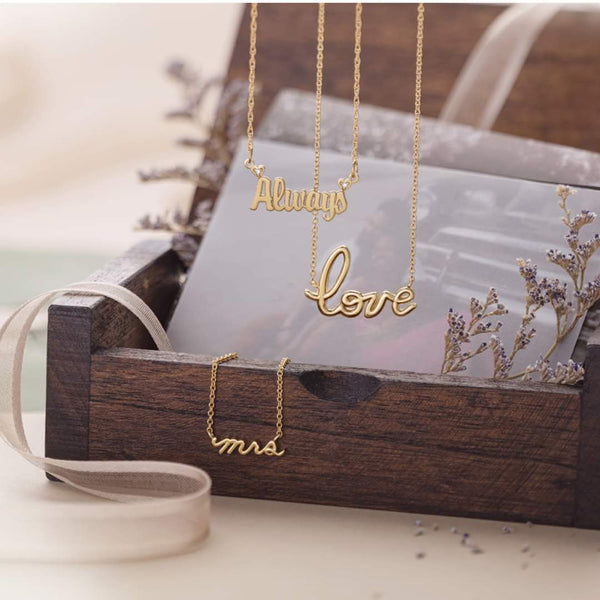 "love" cursive script necklace