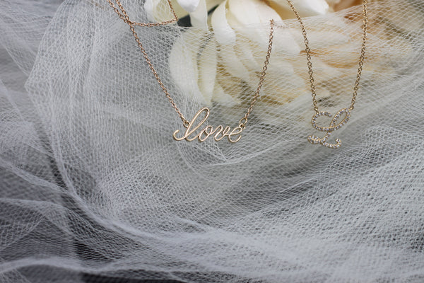 "love" cursive script necklace