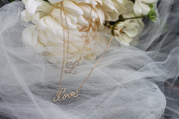 "love" cursive script necklace
