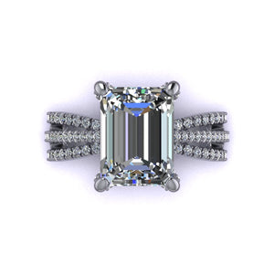 Triple Row Engagement Setting with Diamond Basket Details Tapered triple row of diamonds greatly emphasizes the prominence of the center stone Diamond basket details add a luxurious touch and perfectly cradles the center stone This design is versatile and can customized to fit any shape (oval, round, cushion, princess etc).