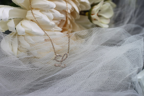 Alphabet diamond cursive/script necklace