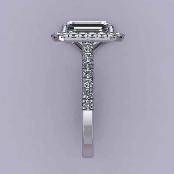Classic Emerald Cut Halo Setting with Tulip Cathedral Profile Elegant Emerald Cut halo with a clean and modern look Cathedral profile made to sit a wedding band flush Designed with perfect proportions of from shank to halo creating a beautiful design aesthetic Designed with tensile strength in mind while maintaining delicate and seamless look. Made with about 20-25% more metal to ensure structural integrity