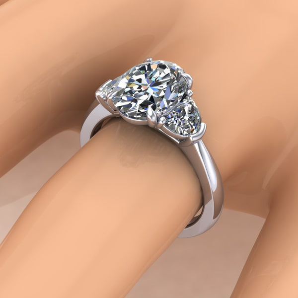 Oval Three-Stone Ring with Half-Moon Accent Diamonds – The Classic Gem
